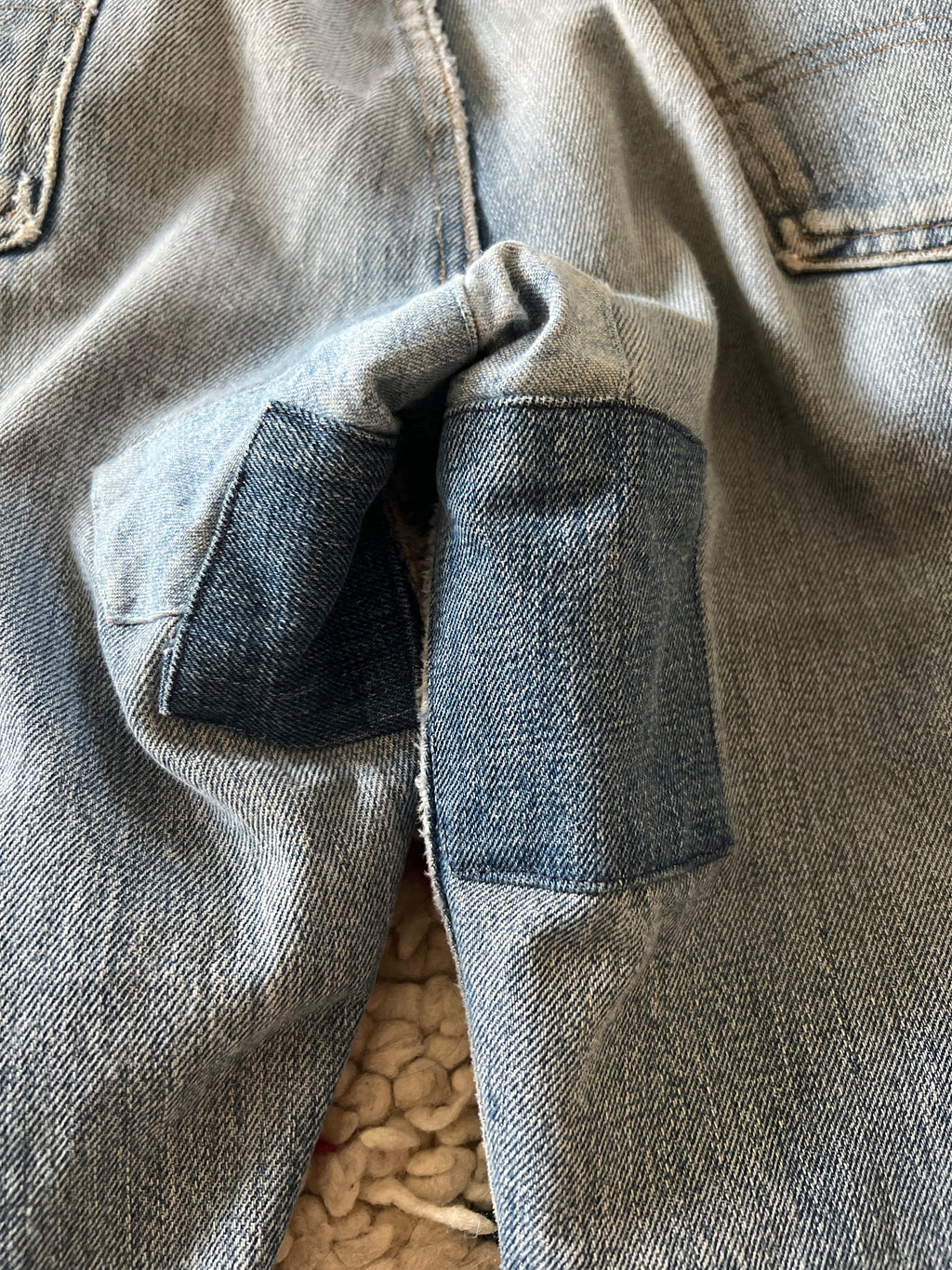 Vintage Levi's 501 orange tab with patchwork bottom.