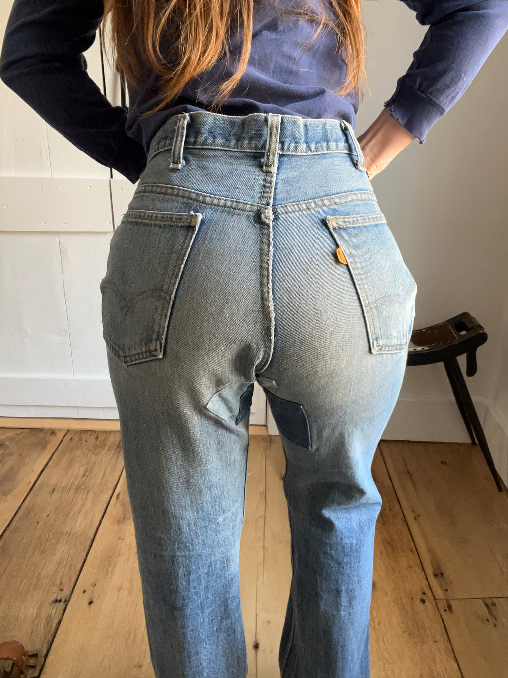 Vintage Levi's 501 orange tab with patchwork bottom.
