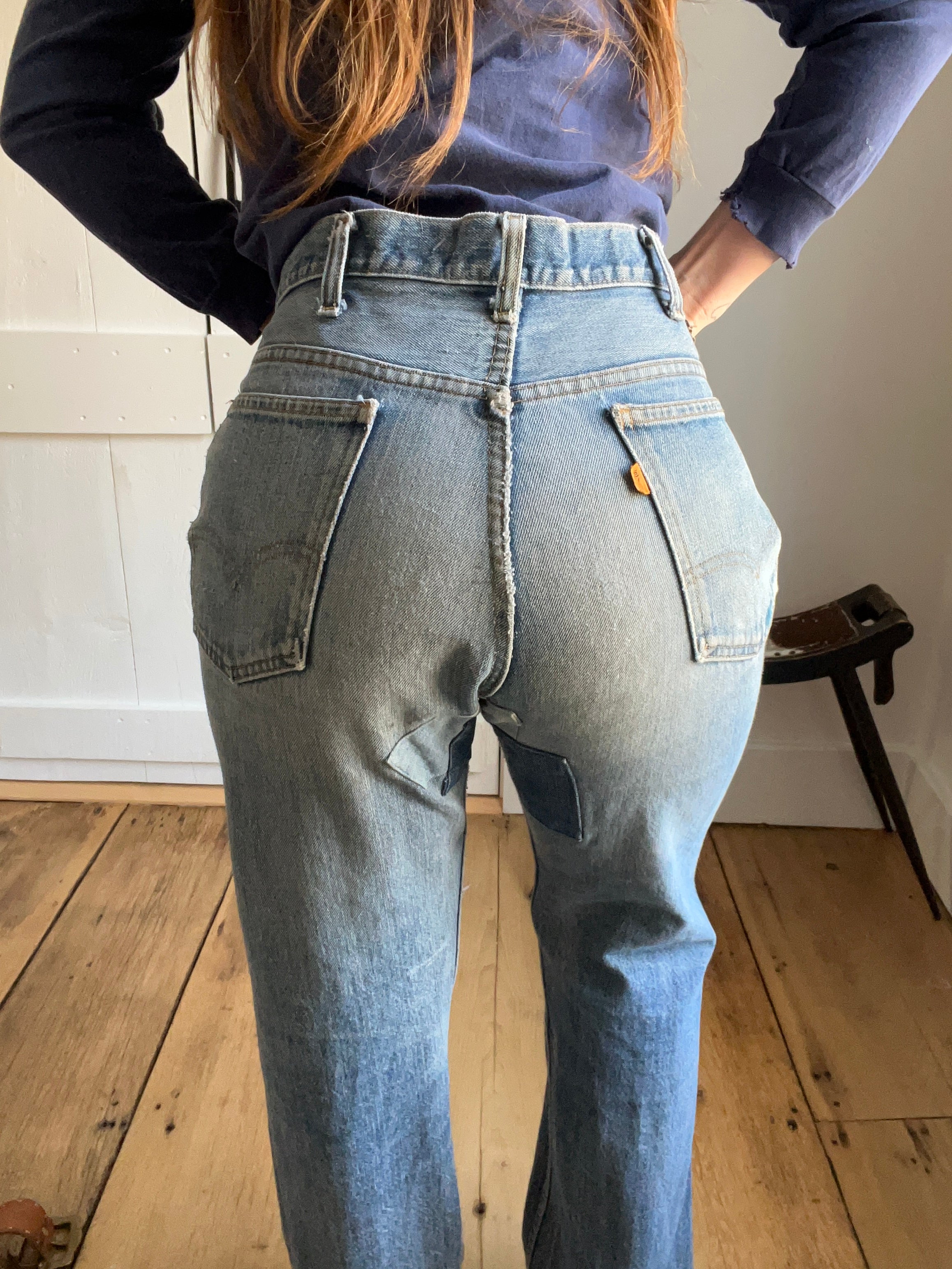 Vintage Levi's 501 orange tab with patchwork bottom.